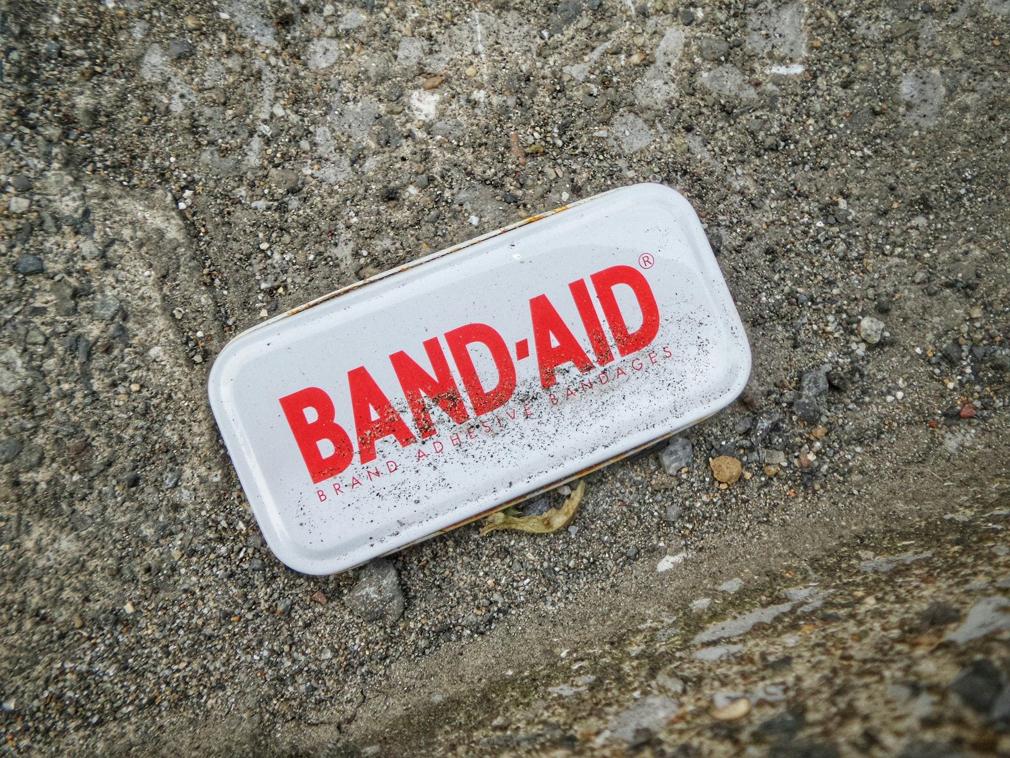 A container of "Band-Aid" bandages.